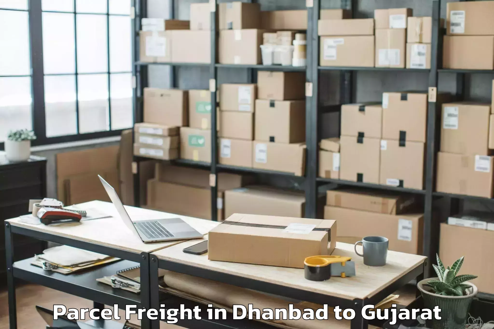 Leading Dhanbad to Amroli Parcel Freight Provider